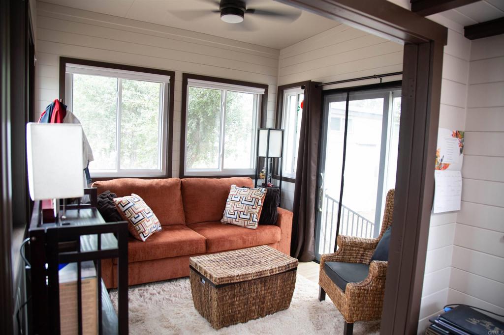 14625 Mussey Grade Road, Unit R67 Ramona, CA 92065 - Photo 11 of 31 a living room with furniture and a window