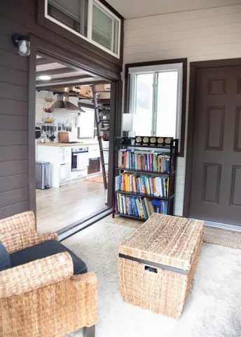 a living room with furniture and a window