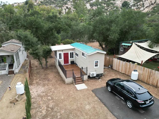 a view of a car in front of house
