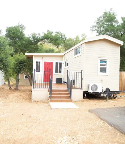 a view of a back yard of the house