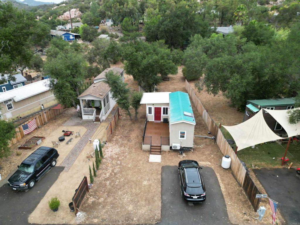 14625 Mussey Grade Road, Unit R67 Ramona, CA 92065 - Photo 22 of 31 an aerial view of a house with swimming pool