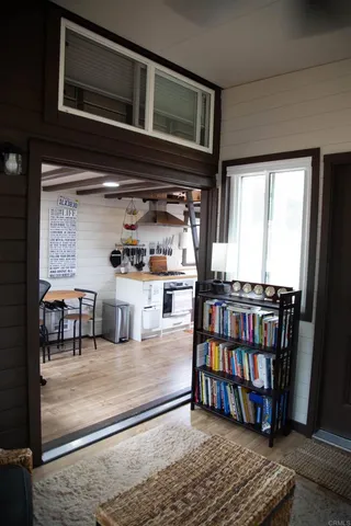a view of a living room and dining room