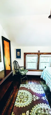 a view of swimming pool with a lounge chair