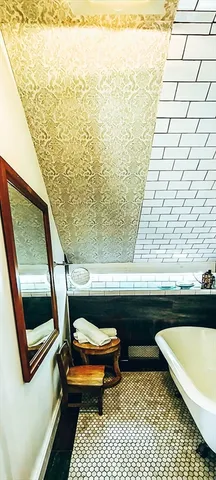 a bathroom with a sink and a bathtub