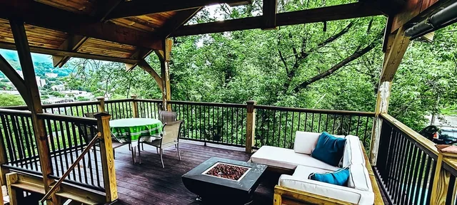 a view of balcony with furniture and wooden deck