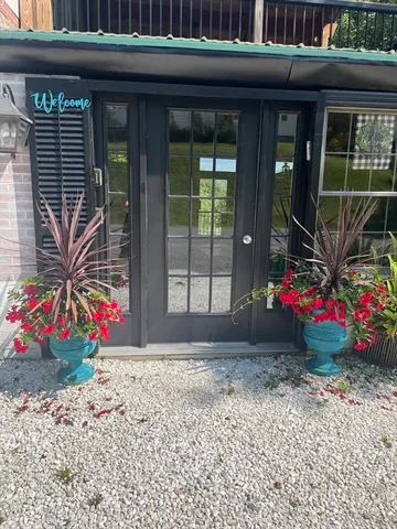 a house view with a garden space