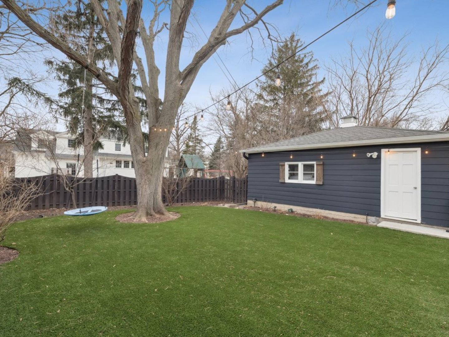 518 Vine Avenue Park Ridge, IL 60068 - Photo 23 of 27 a view of a backyard with a large tree