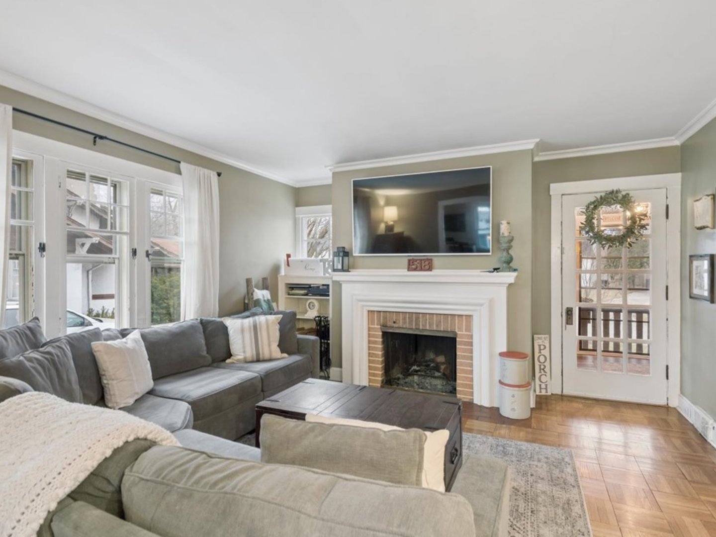 518 Vine Avenue Park Ridge, IL 60068 - Photo 3 of 27 a living room with furniture and a fireplace