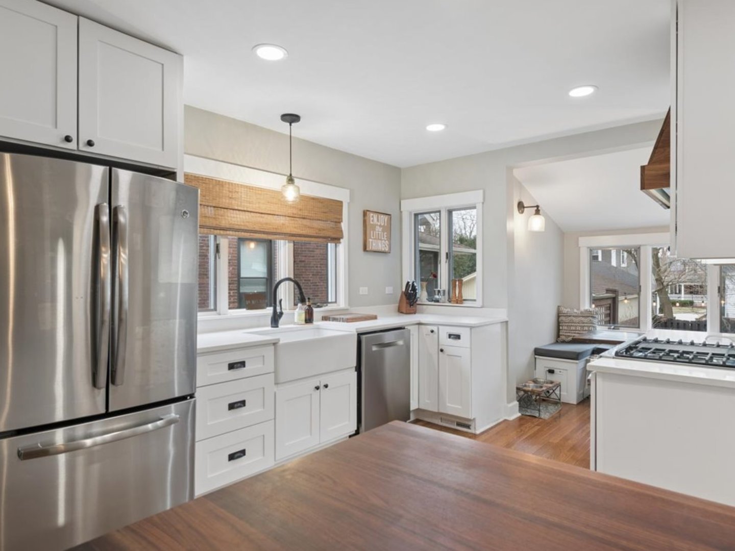 518 Vine Avenue Park Ridge, IL 60068 - Photo 8 of 27 a kitchen with white cabinets and refrigerator