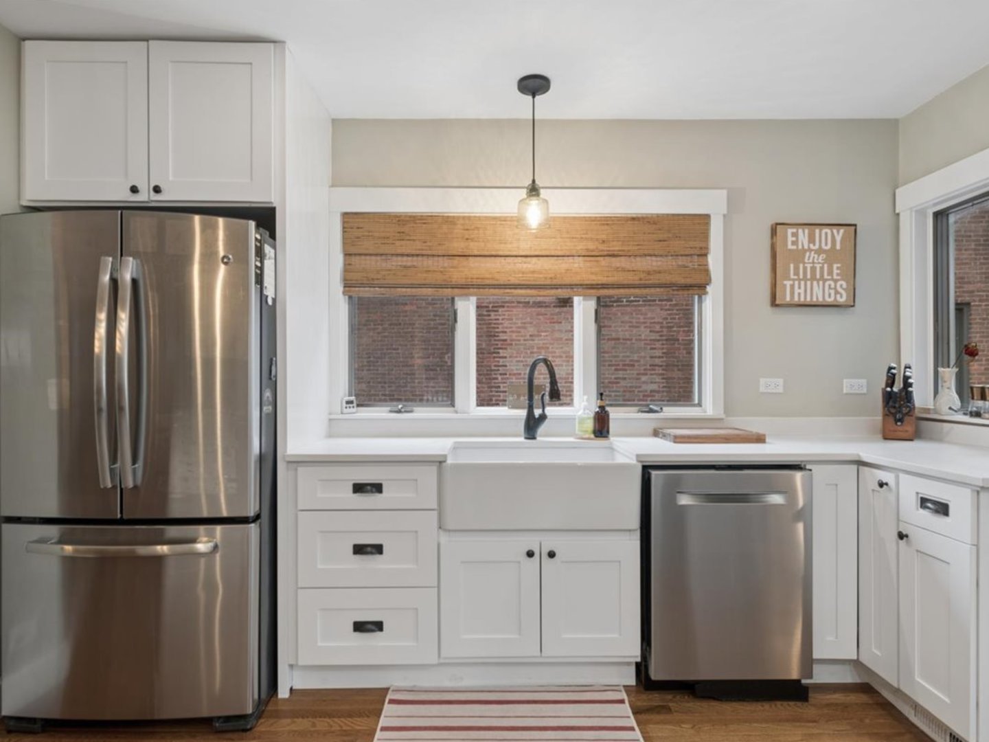 518 Vine Avenue Park Ridge, IL 60068 - Photo 10 of 27 a kitchen with a refrigerator sink and cabinets