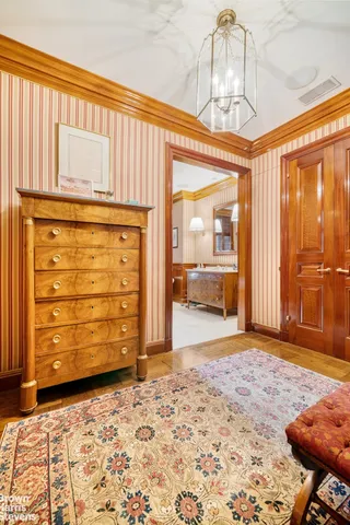 a view of a hallway with a bedroom