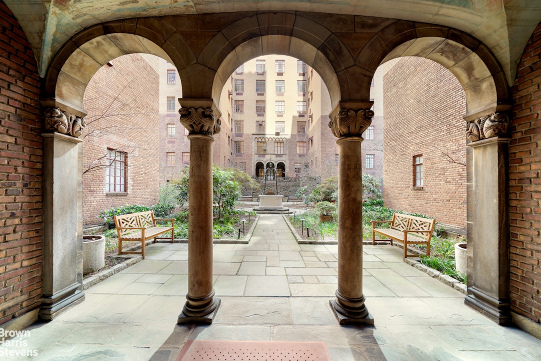 116 East 68th Street, Unit 7/8D Manhattan, NY 10065 - Photo 13 of 14 a view of entrance gate of a house with a porch