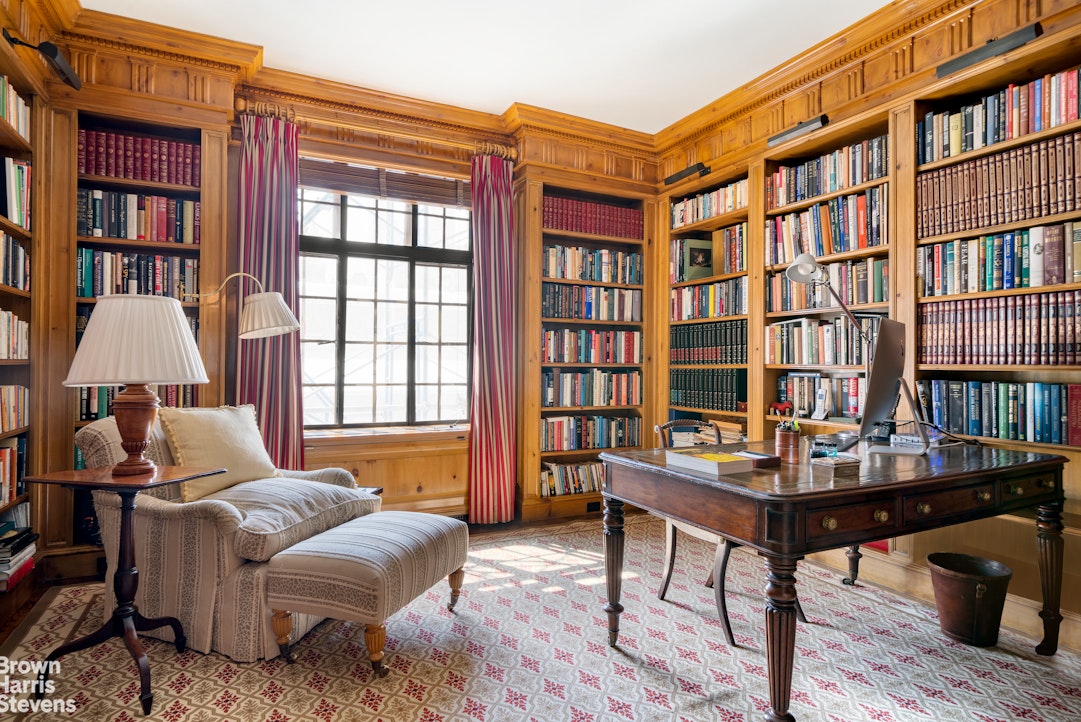 116 East 68th Street, Unit 7/8D Manhattan, NY 10065 - Photo 4 of 14 a living room with furniture and a window