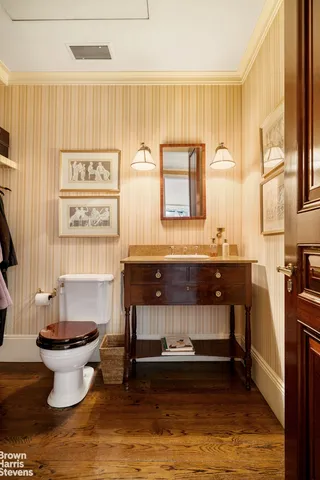 a living room with furniture a window and a sink