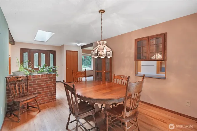 a kitchen with a refrigerator and a sink
