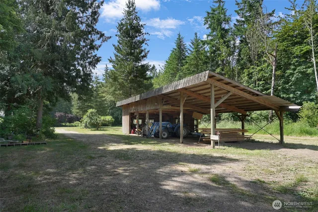 a view of a lake with a yard