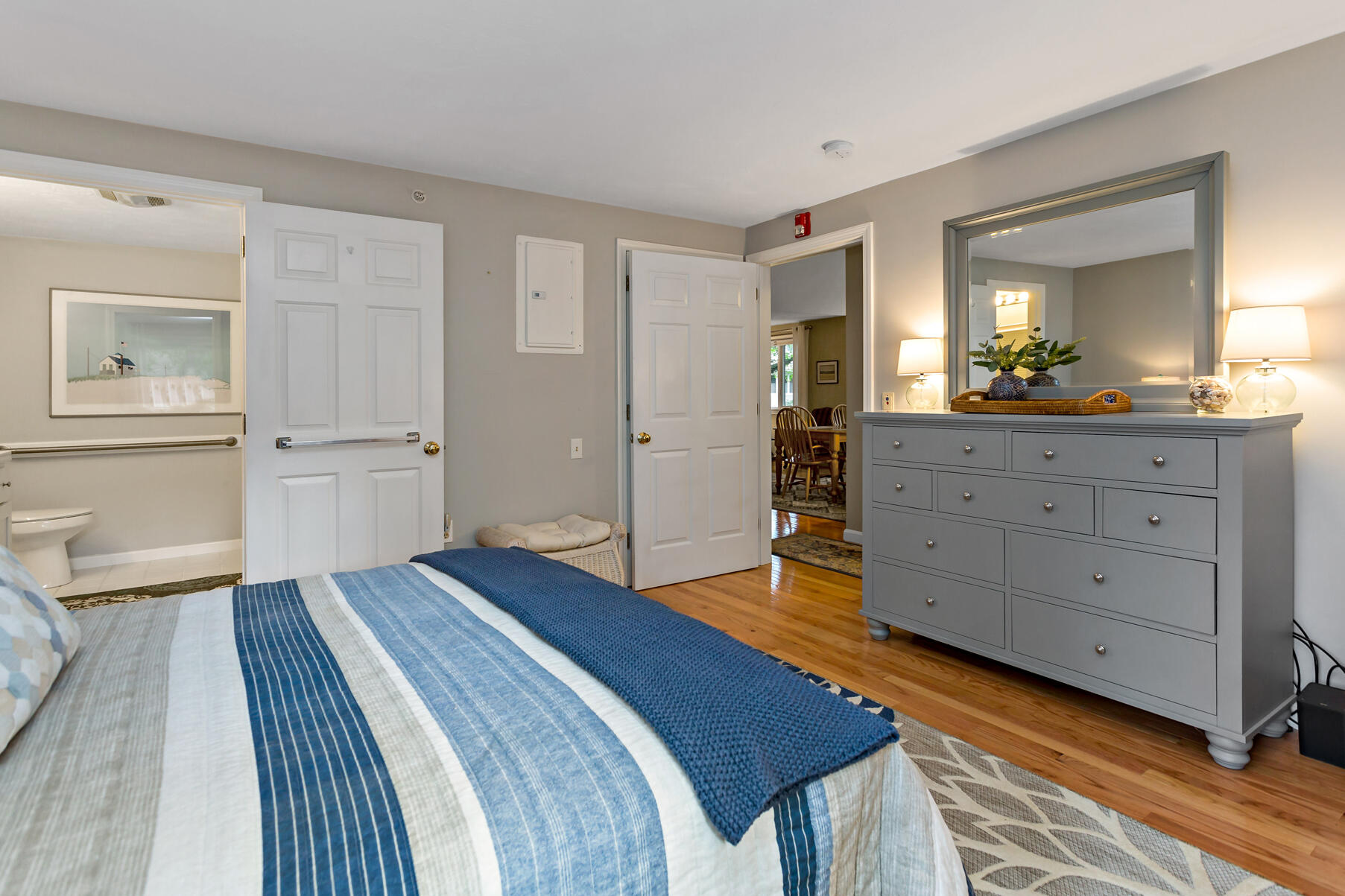 6 Friendship Court Mashpee, MA 02649 - Photo 13 of 39 a bedroom with a bed and wooden floor