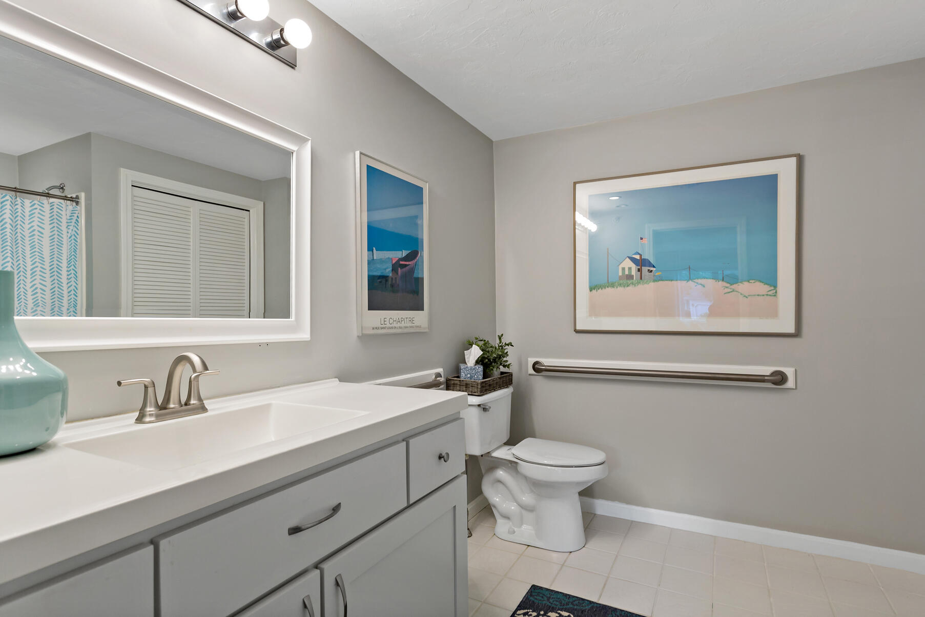 6 Friendship Court Mashpee, MA 02649 - Photo 15 of 39 a bathroom with a toilet a sink and mirror