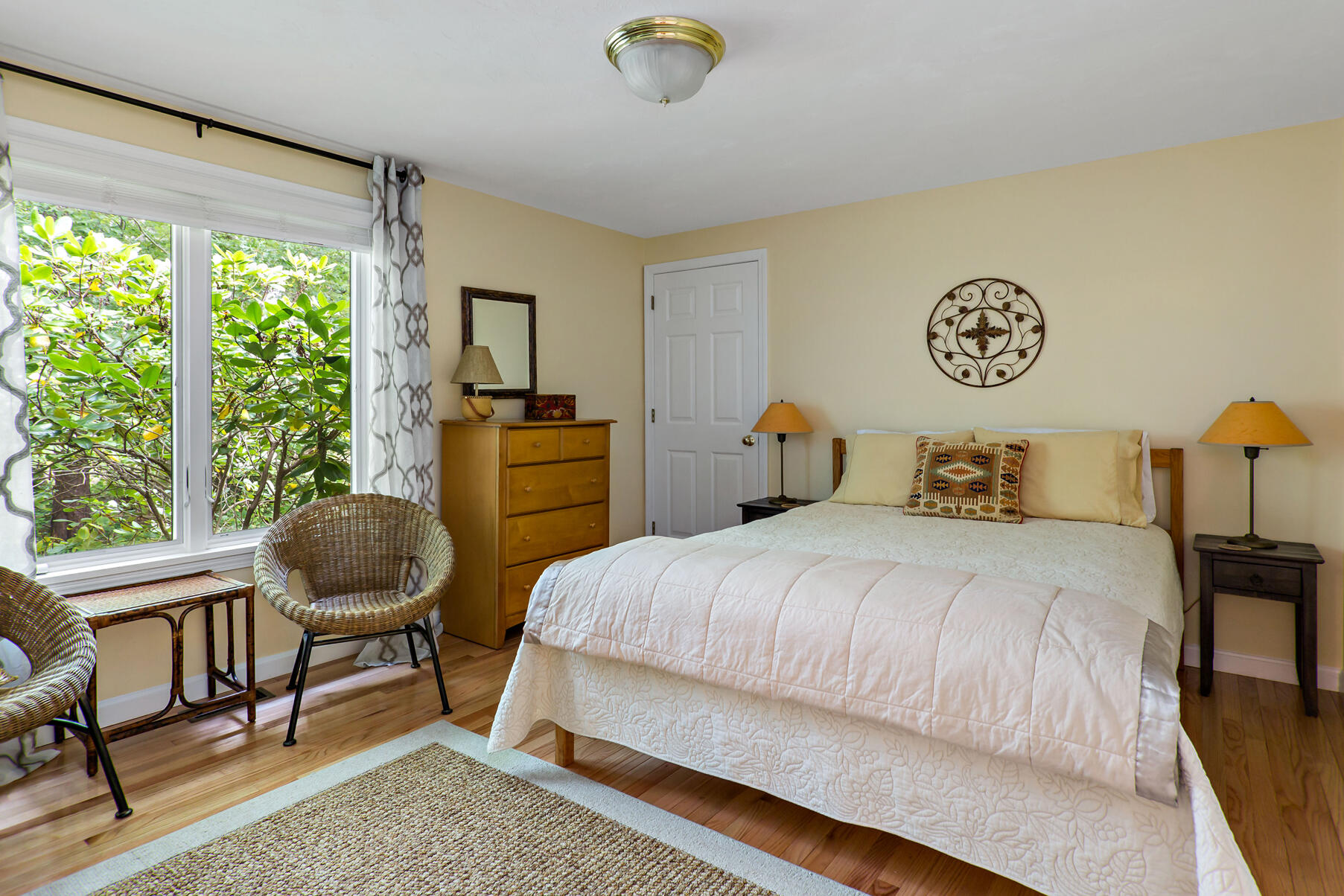 6 Friendship Court Mashpee, MA 02649 - Photo 17 of 39 a bedroom with a bed and a chair