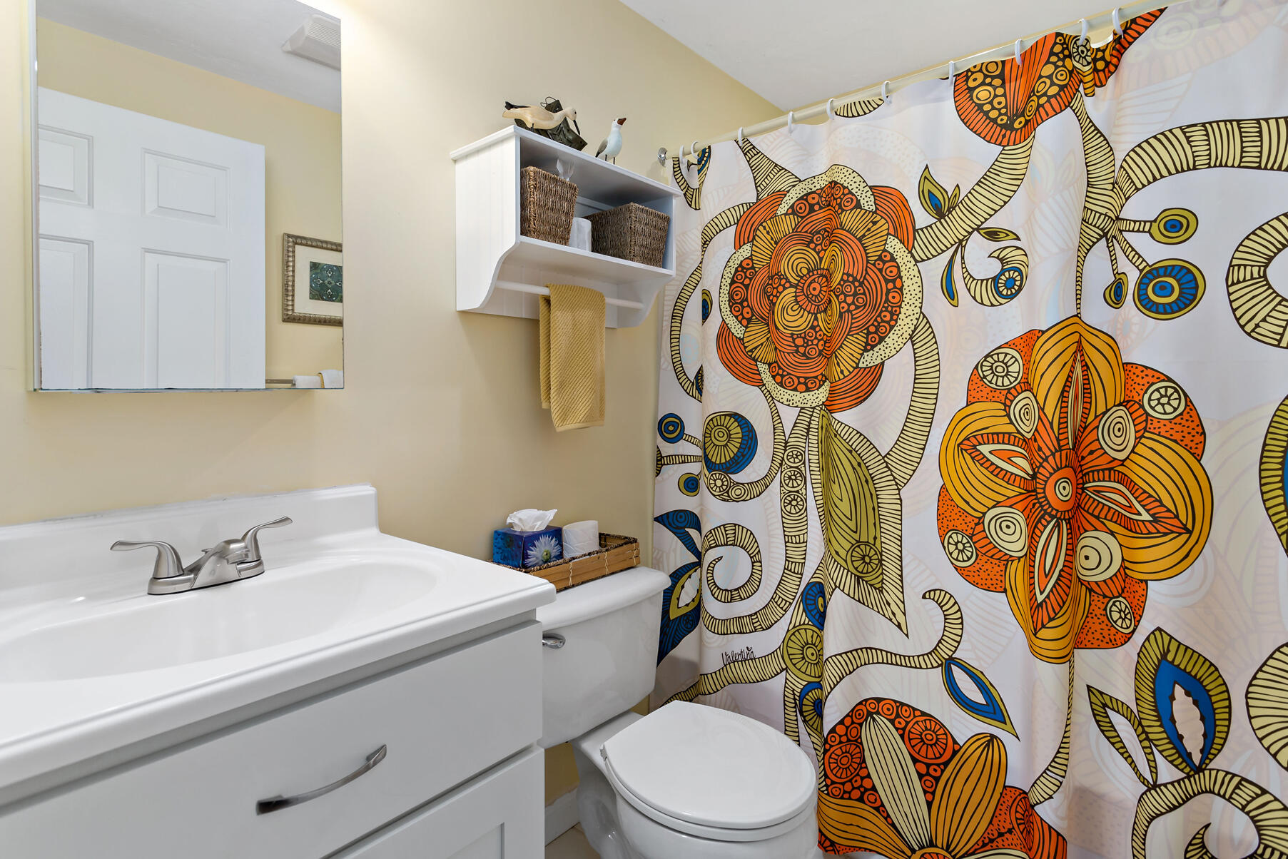 6 Friendship Court Mashpee, MA 02649 - Photo 18 of 39 a bathroom with a sink and mirror with toilet