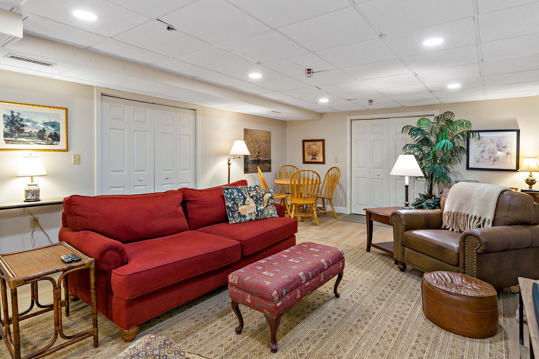 6 Friendship Court Mashpee, MA 02649 - Photo 21 of 39 a living room with furniture and a wooden floor