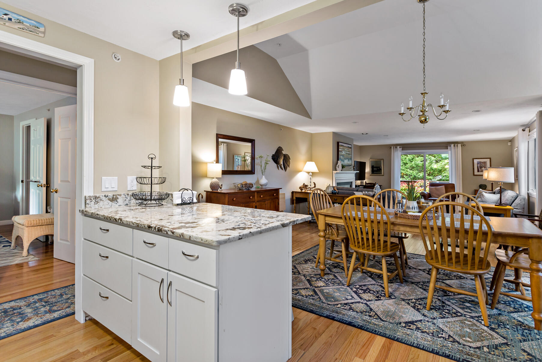 6 Friendship Court Mashpee, MA 02649 - Photo 7 of 39 a view of dining table chairs and chandelier