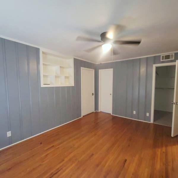 3459 Monte Carlo Street Dallas, TX 75224 - Photo 15 of 23 a view of empty room with wooden floor