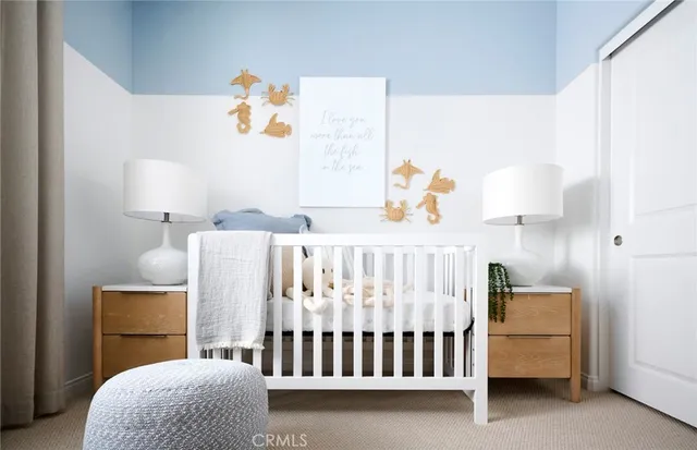 a bedroom with a bed and a couch