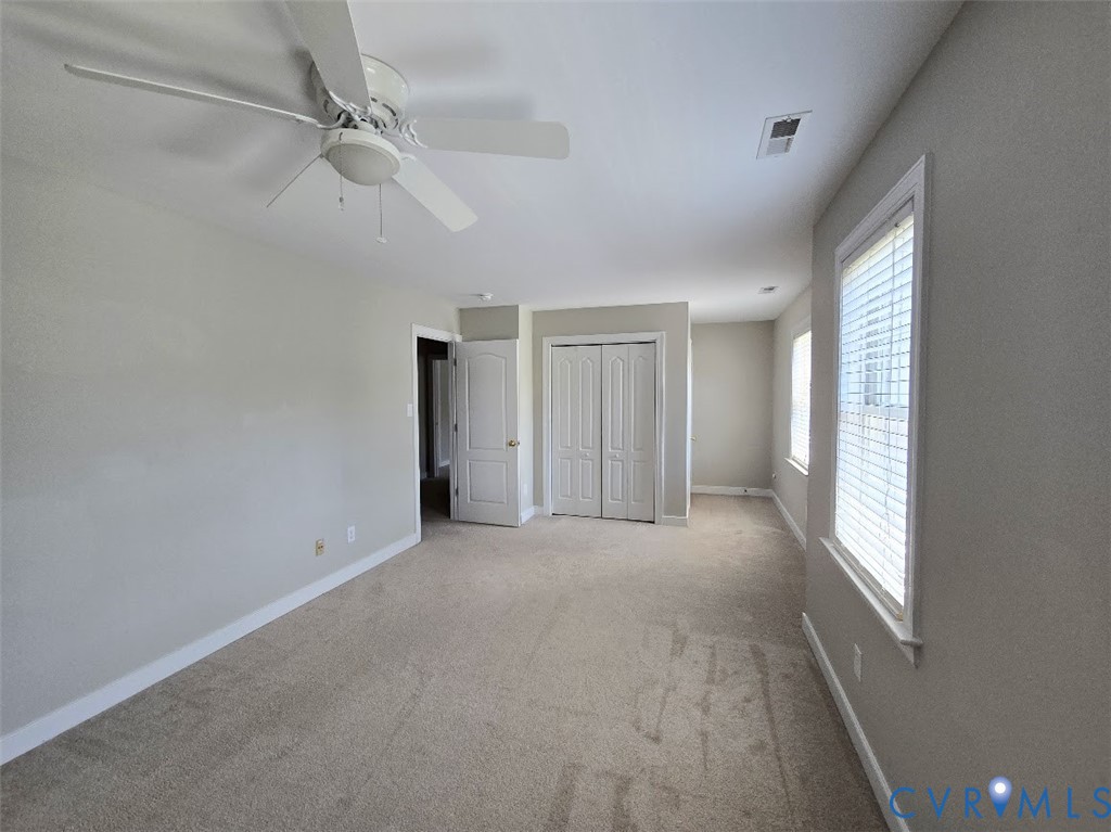 16406 Benmore Road Moseley, VA 23120 - Photo 20 of 32 a view of an empty room with a window