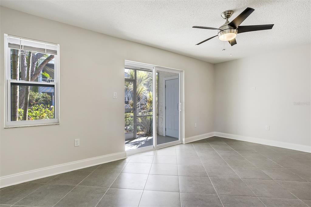 243 South McMullen Booth Road, Unit 29 Clearwater, FL 33759 - Photo 5 of 20 a view of an empty room with a window