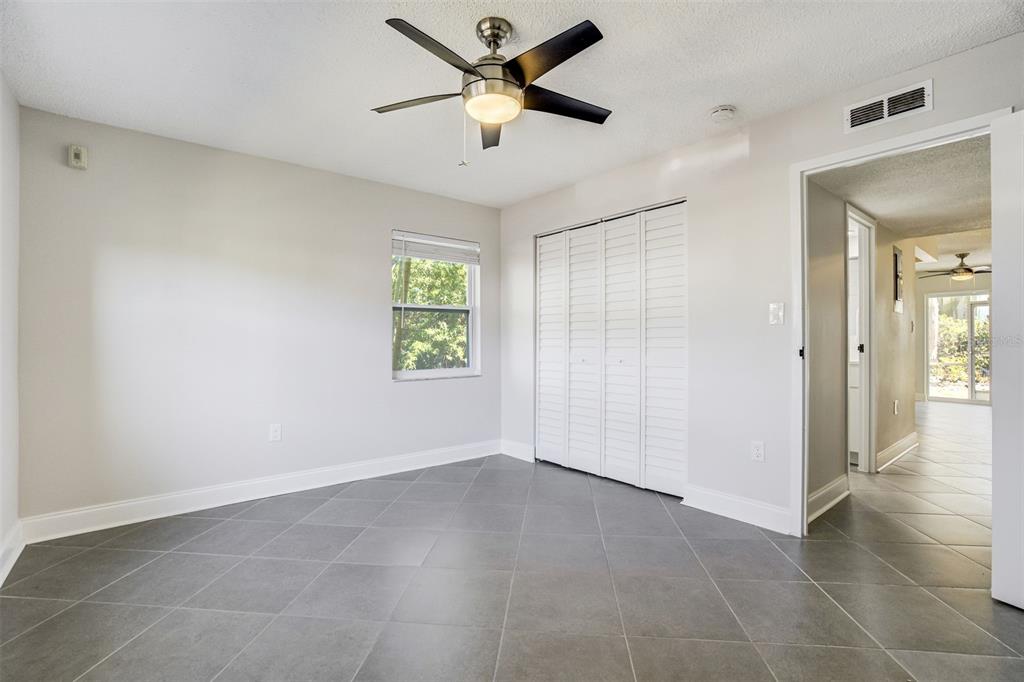 243 South McMullen Booth Road, Unit 29 Clearwater, FL 33759 - Photo 7 of 20 a view of an empty room and a window