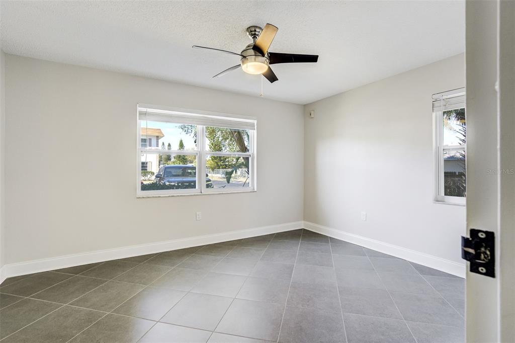 243 South McMullen Booth Road, Unit 29 Clearwater, FL 33759 - Photo 10 of 20 a view of an empty room with a window