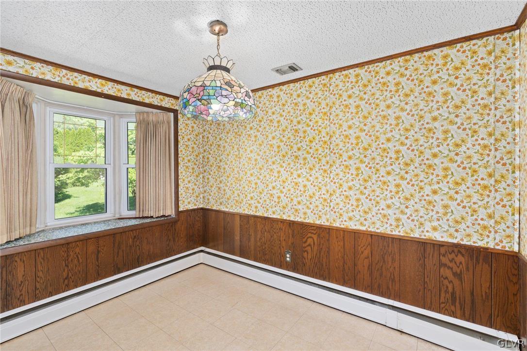 128 7th Street Whitehall, PA 18052 - Photo 11 of 29 a view of an empty room and window