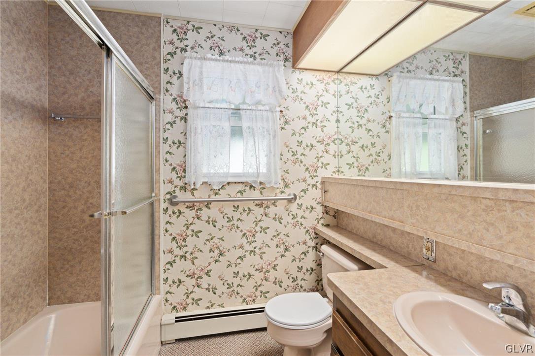 128 7th Street Whitehall, PA 18052 - Photo 15 of 29 a bathroom with a sink toilet and shower