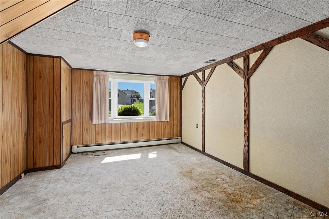 128 7th Street Whitehall, PA 18052 - Photo 17 of 29 a view of an empty room with a window