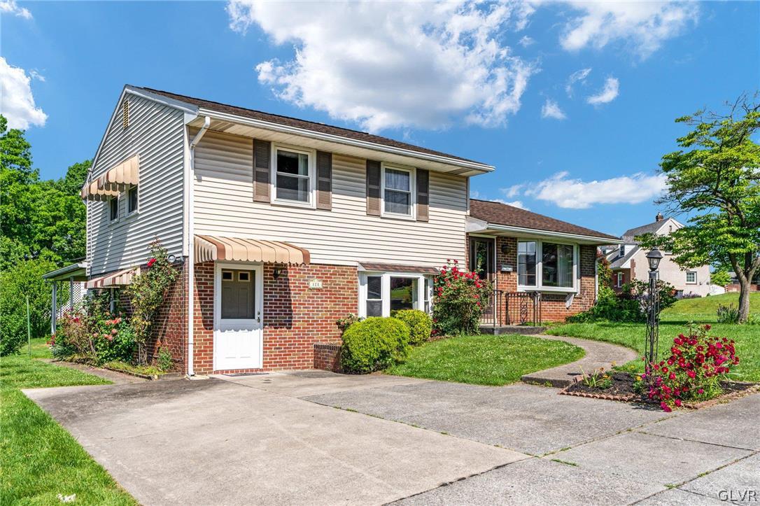 128 7th Street Whitehall, PA 18052 - Photo 2 of 29 a front view of house with yard and green space