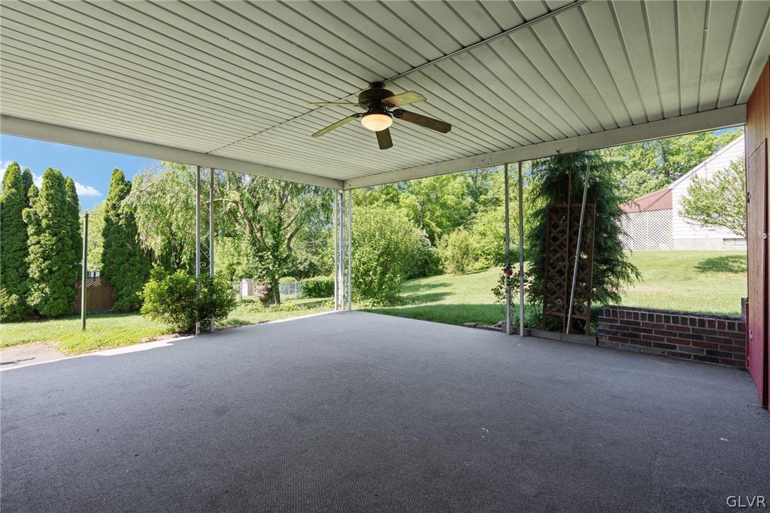 128 7th Street Whitehall, PA 18052 - Photo 22 of 29 a view of a garden with porch