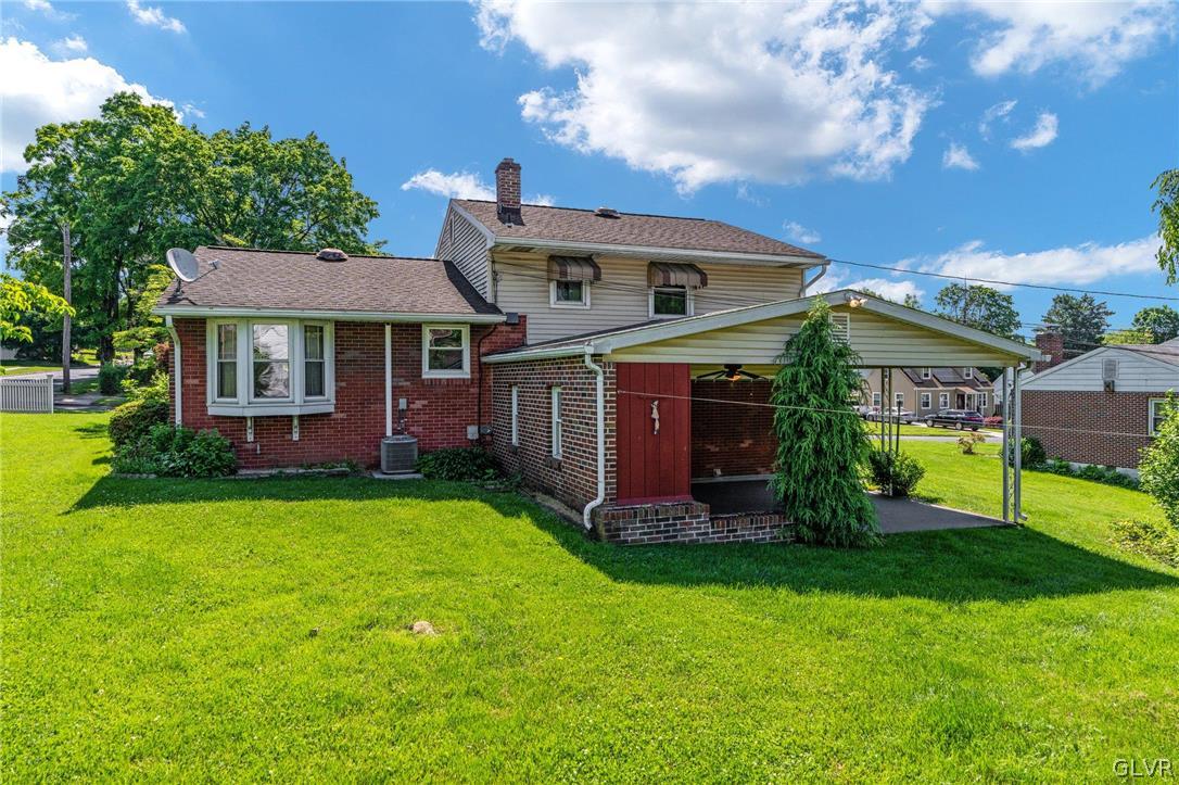 128 7th Street Whitehall, PA 18052 - Photo 26 of 29 a front view of house with yard and green space