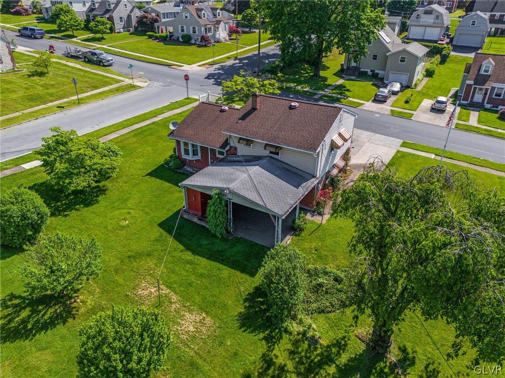 128 7th Street Whitehall, PA 18052 - Photo 27 of 29 an aerial view of a house with a garden