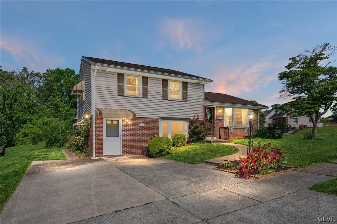 128 7th Street Whitehall, PA 18052 - Photo 5 of 29 a front view of a house with a yard