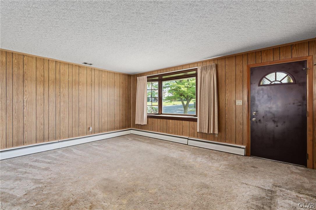 128 7th Street Whitehall, PA 18052 - Photo 6 of 29 an empty room with windows