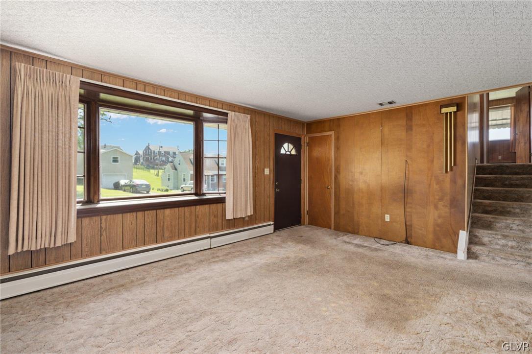 128 7th Street Whitehall, PA 18052 - Photo 7 of 29 an empty room with windows