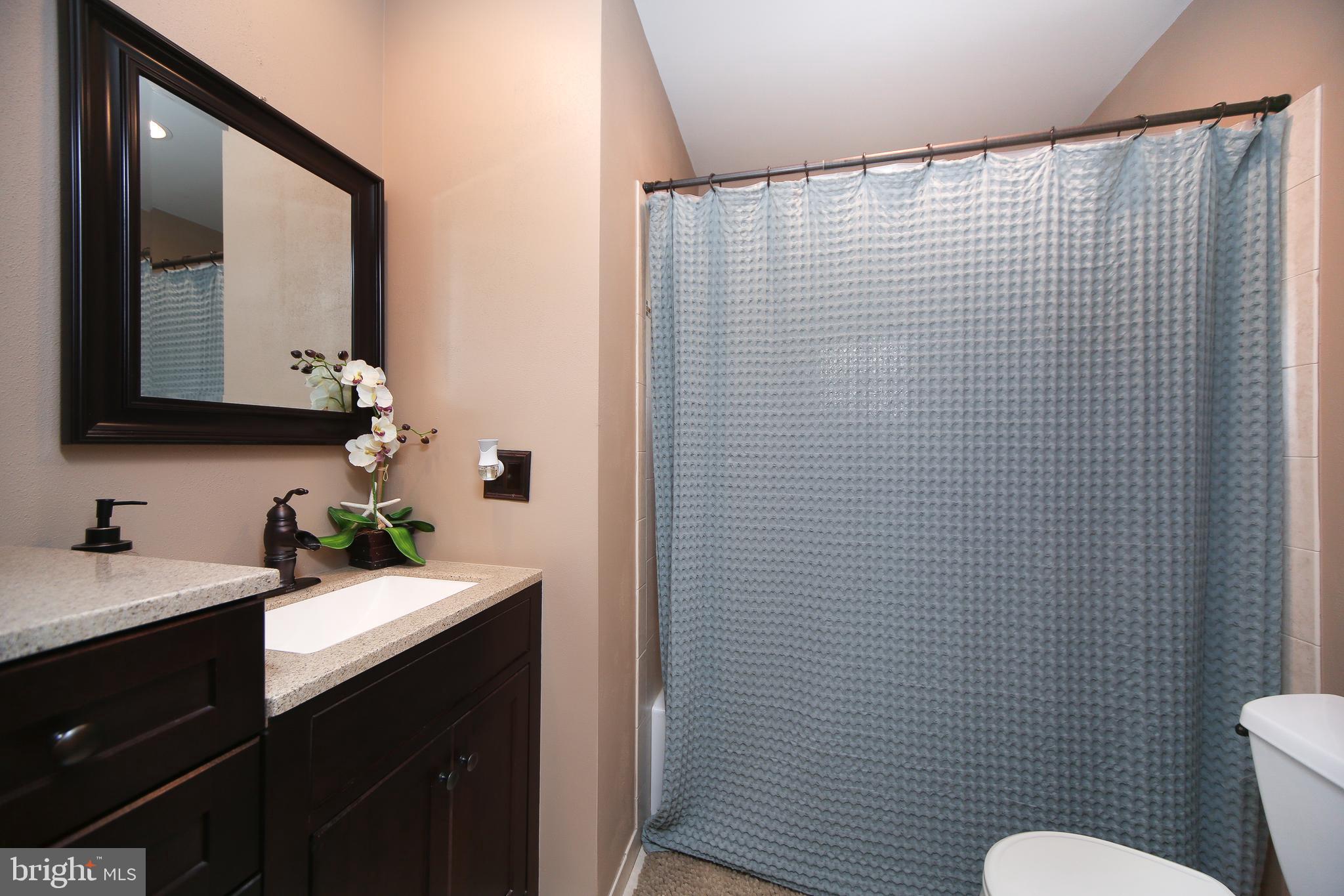 17 Hyacinth Road Levittown, PA 19056 - Photo 16 of 33 Downstairs Full Bath