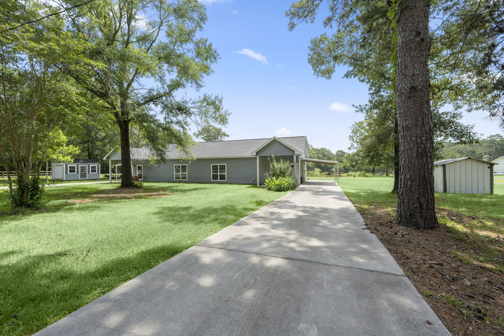 10871 Coaster Lane Conroe, TX 77306 - Photo 14 of 37 Unit #2 with long concrete driveway and lots of room to park.