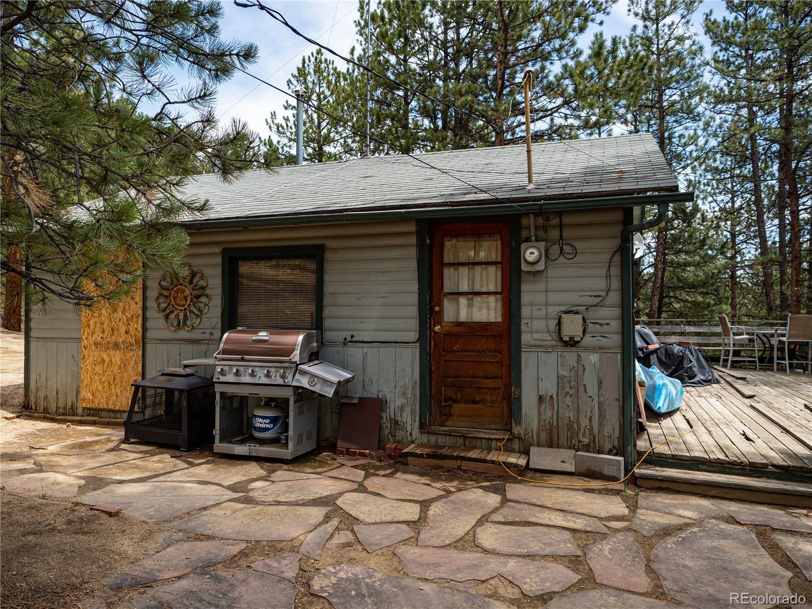 470 Mesa Drive Evergreen, CO 80439 - Photo 5 of 28 a view of a car parked in garage