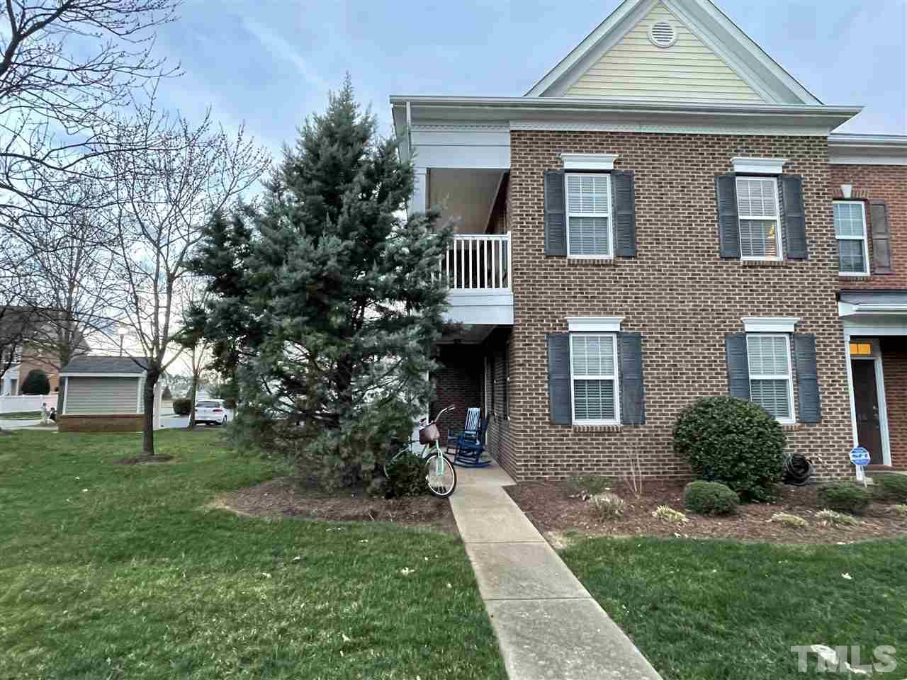1368 Regulator Street Raleigh, NC 27603 - Photo 1 of 18 a front view of a house with garden