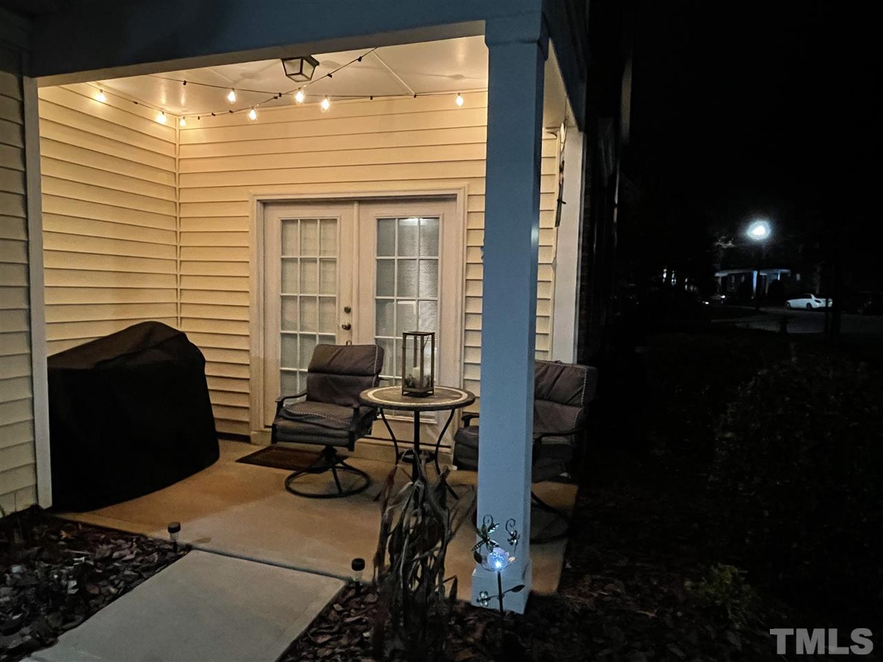 1368 Regulator Street Raleigh, NC 27603 - Photo 14 of 18 a view of a balcony with chairs and a stove
