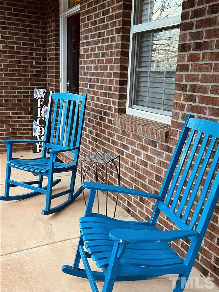 1368 Regulator Street Raleigh, NC 27603 - Photo 3 of 18 a view of a chairs and table in the patio