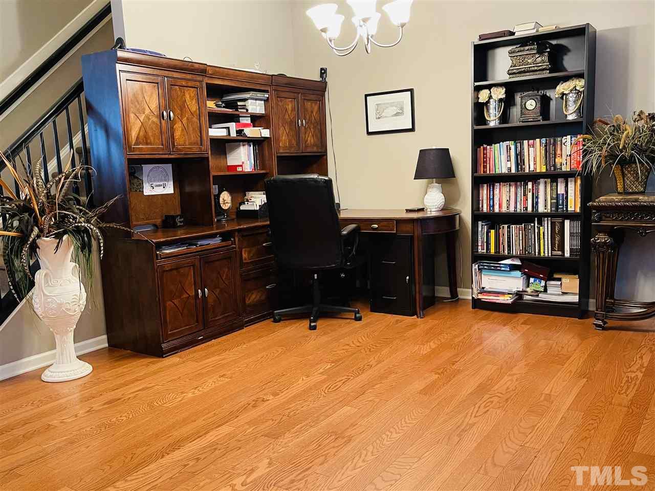1368 Regulator Street Raleigh, NC 27603 - Photo 6 of 18 a room with furniture and gym equipment