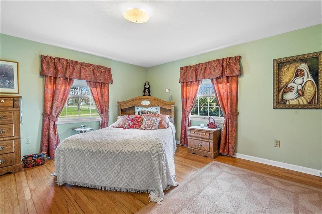 123 Buttercup Road Butler, PA 16001 - Photo 6 of 25 a bedroom with a bed and a window
